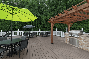 The greens at hollymead poolside lounge & grilling area
